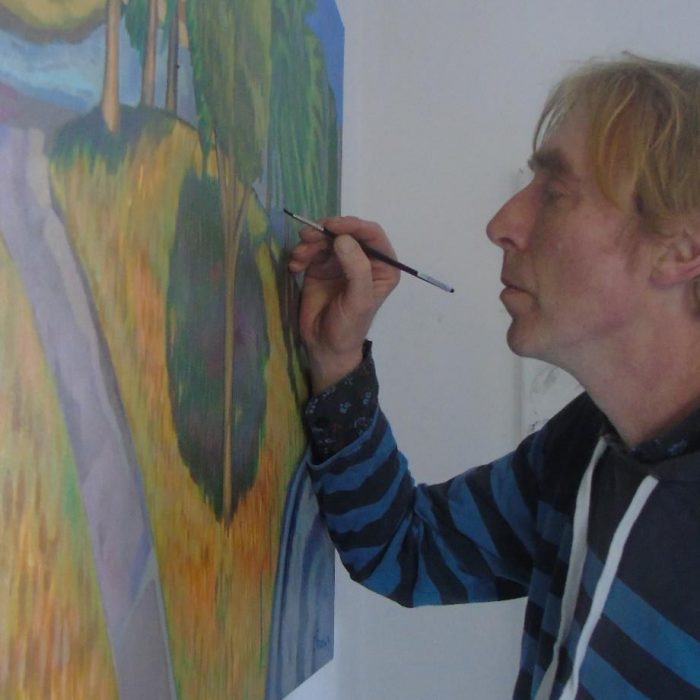 rish Artist David O'Rourke in action painting an image of Australia