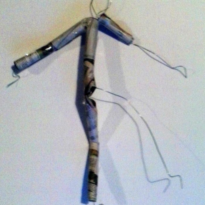 A figure made of wire, coated paper for an art project